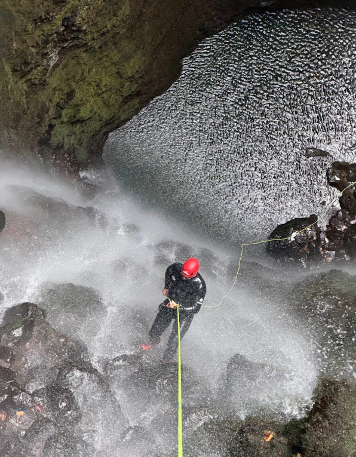 canyoning/rappel down a waterfall